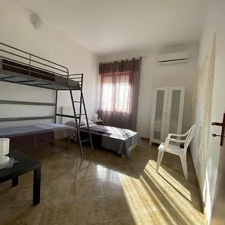 Marinella Casa de Férias